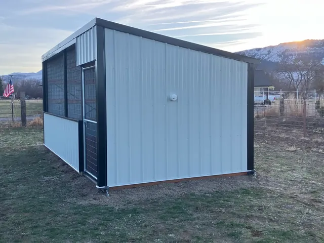 Enclosed metal shelter suitable for animals or equipment storage